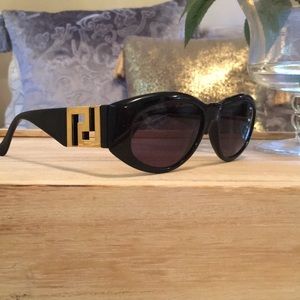 Gianni Versace Vintage 1990s Black Gold Oval Sunglasses Script Logo